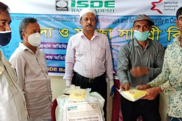 MP Zafar Alam distributes ISDE food and disinfectants kits among 200 Jobless families in Chiringa Union, Chakaria